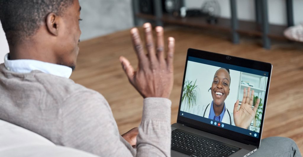 A man on a virtual appointment with a doctor