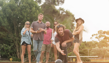 Group playing croquet