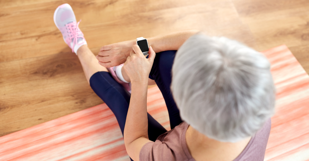 woman looking at her smart watch