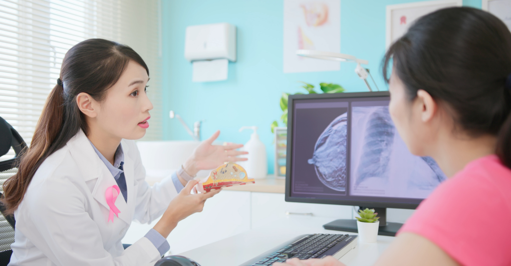 Women looking at breast cancer imaging