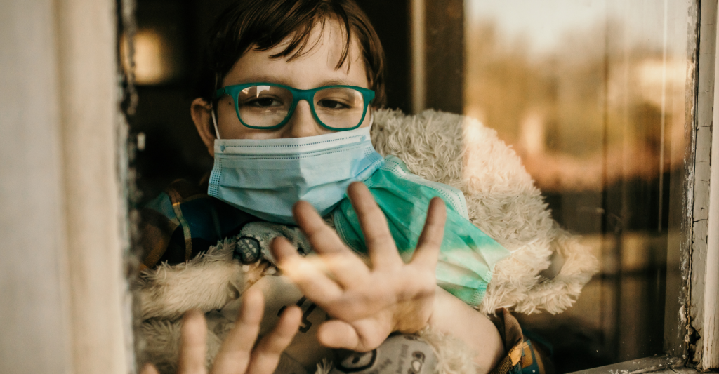 Woman wearing mask with COVID