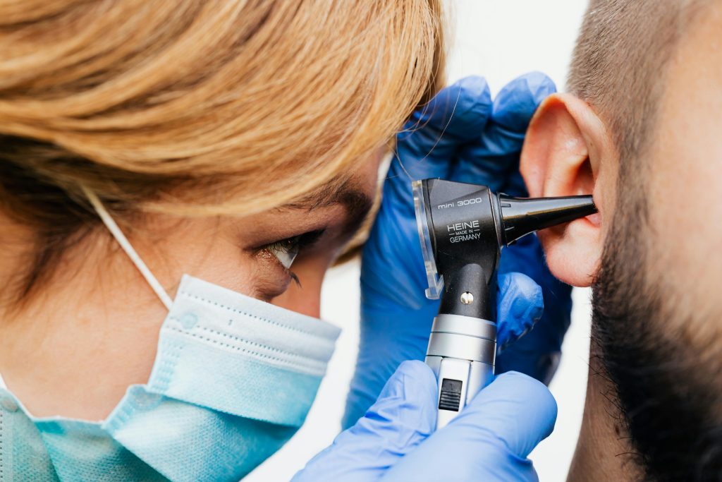 Doctor performing a hearing test