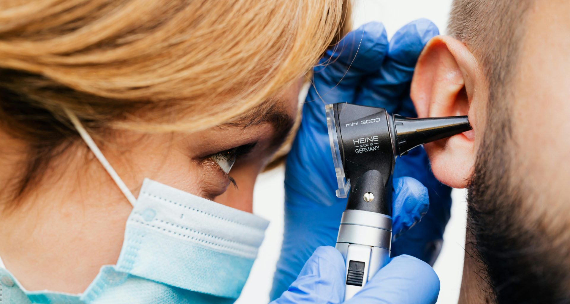 Doctor performing a hearing test